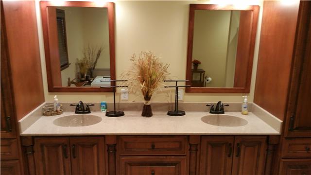 9035 Alex Goins Road Lyles, TN 37098 - Photo 13 of 20 Master bath is spacious with double vanity and closets on each side.