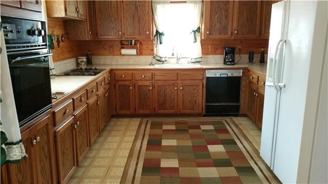 9035 Alex Goins Road Lyles, TN 37098 - Photo 8 of 20 Full kitchen with plenty counter space and built in cook top.