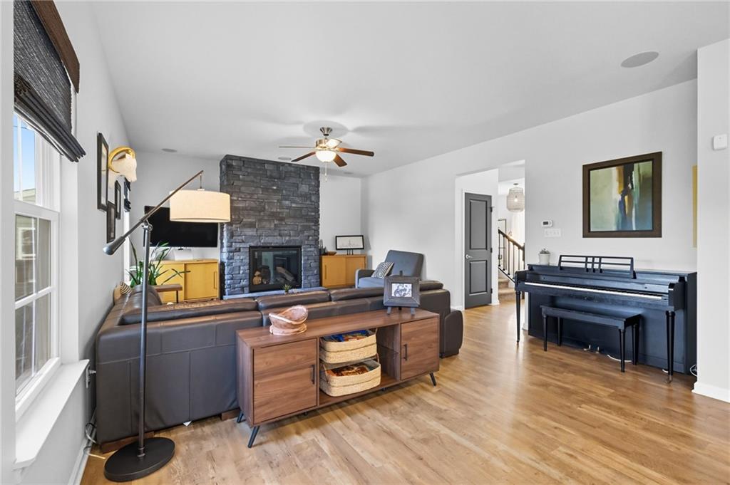 347 Ranchero Drive Coraopolis, PA 15108 - Photo 12 of 46 a living room with furniture and a fireplace