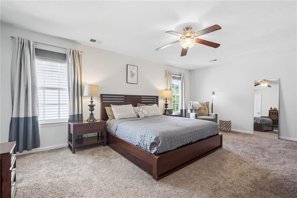 347 Ranchero Drive Coraopolis, PA 15108 - Photo 22 of 46 a bedroom with a bed and ceiling fan