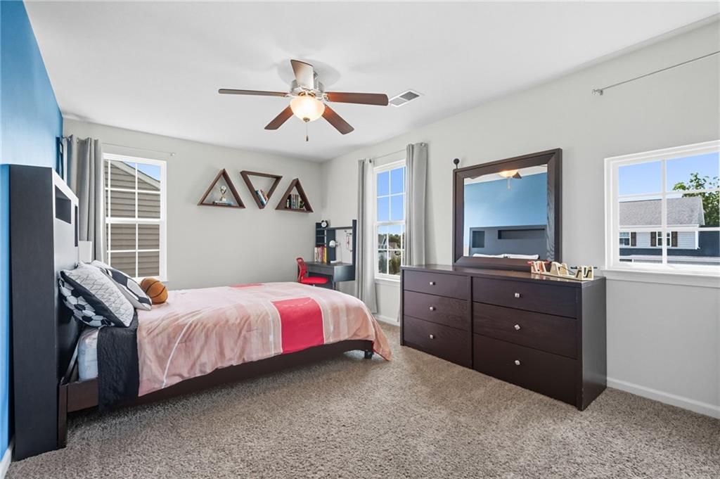 347 Ranchero Drive Coraopolis, PA 15108 - Photo 27 of 46 a bedroom with a bed and a dresser