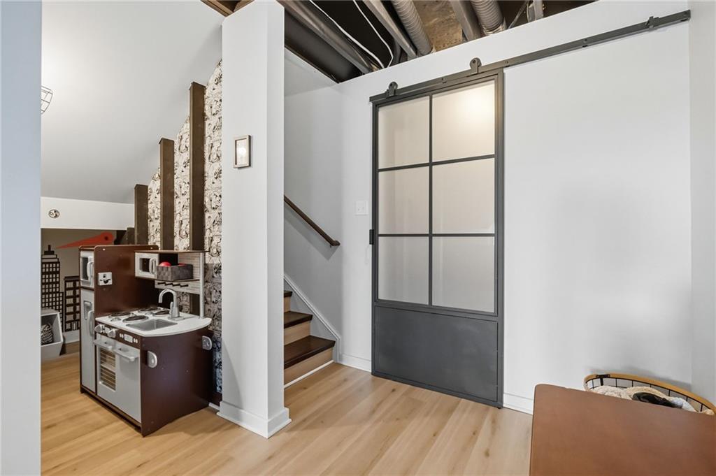 347 Ranchero Drive Coraopolis, PA 15108 - Photo 31 of 46 a view of a kitchen with wooden floor and electronic appliances