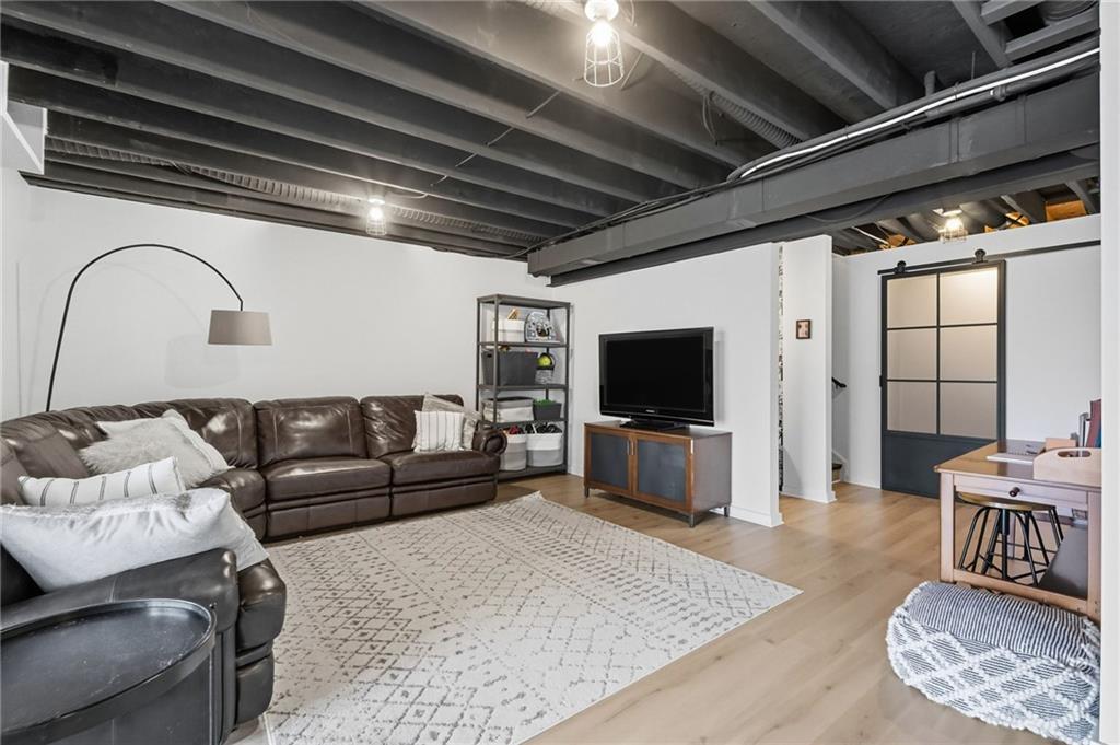 347 Ranchero Drive Coraopolis, PA 15108 - Photo 33 of 46 a living room with furniture and a flat screen tv