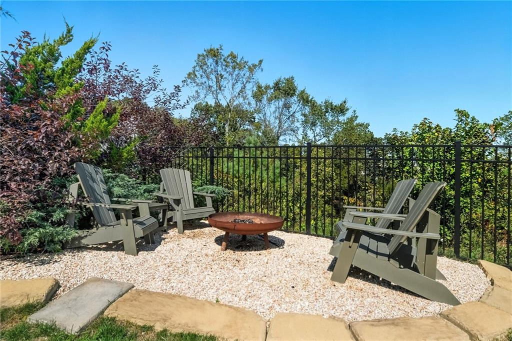 347 Ranchero Drive Coraopolis, PA 15108 - Photo 42 of 46 a view of a chair and tables in the patio