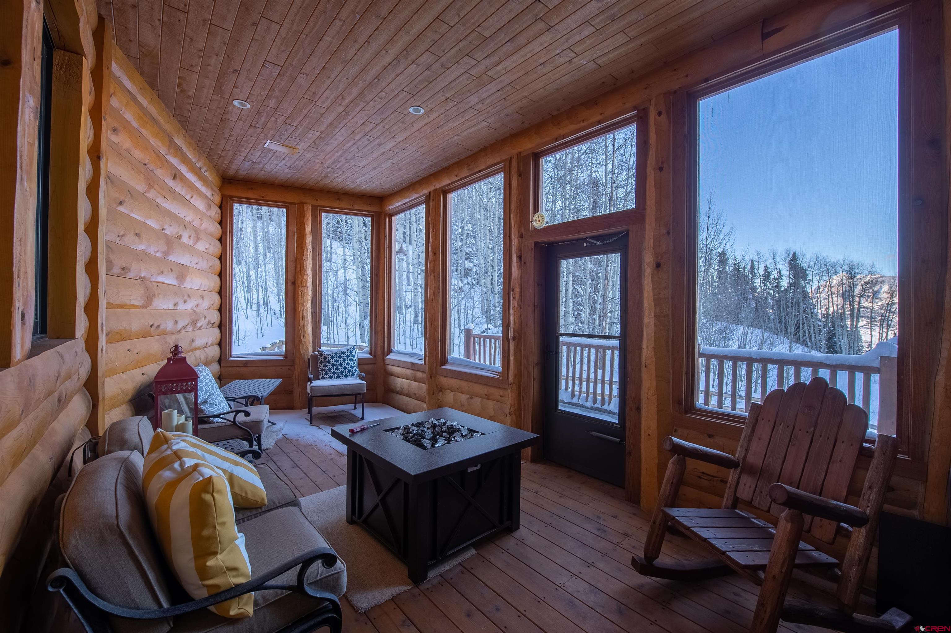 1894 Red Mountain Ranch Road Crested Butte, CO 81224 - Photo 19 of 34 a living room with furniture and large windows