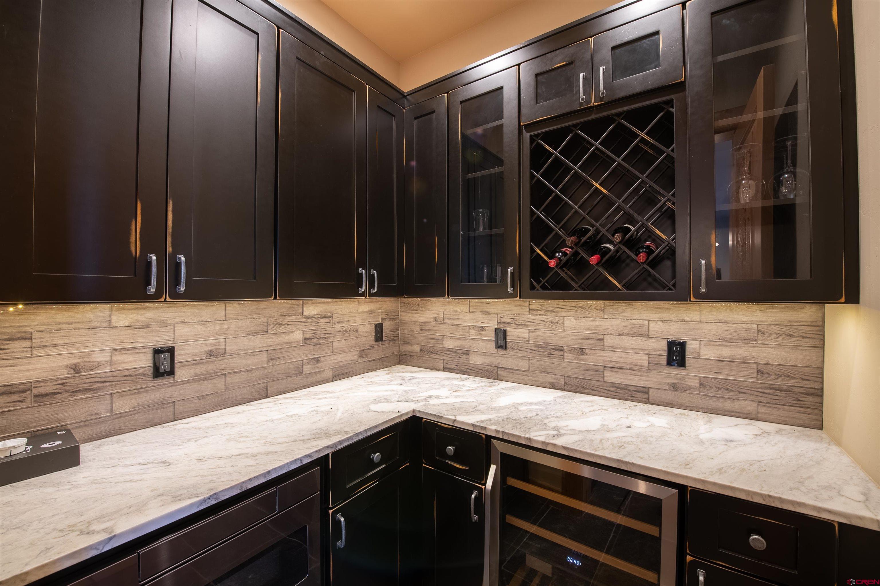 1894 Red Mountain Ranch Road Crested Butte, CO 81224 - Photo 29 of 34 a kitchen with a sink and cabinets
