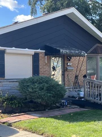 a house view with a garden space