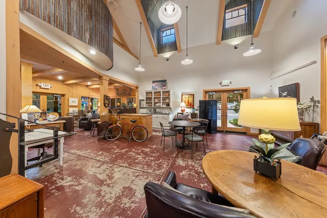 a living room with lots of furniture and appliances