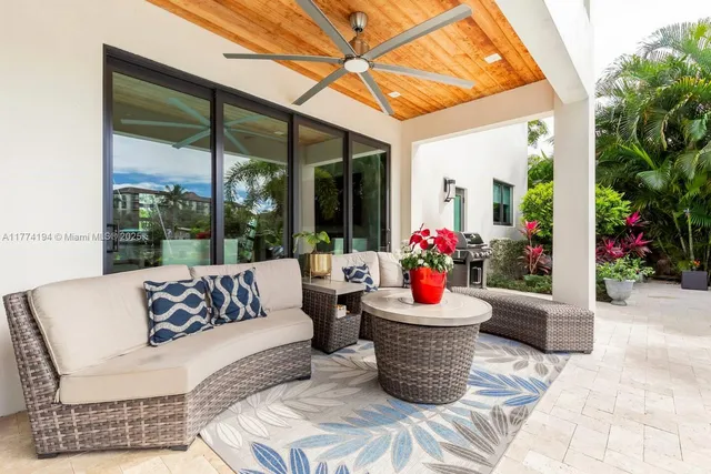 a outdoor living space with furniture and garden view