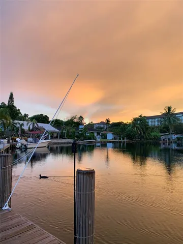 a lake view with a sitting space and a lake view