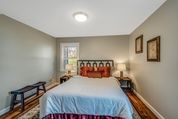 36 Whalom Road Lunenburg, MA 01462 - Photo 20 of 26 a bedroom with a bed and window