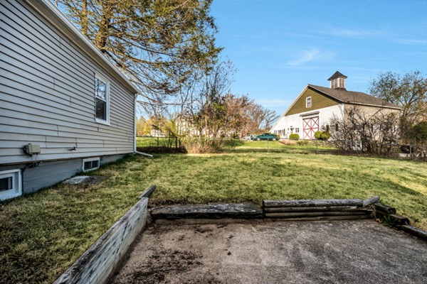 36 Whalom Road Lunenburg, MA 01462 - Photo 23 of 26 a view of a back yard of the house