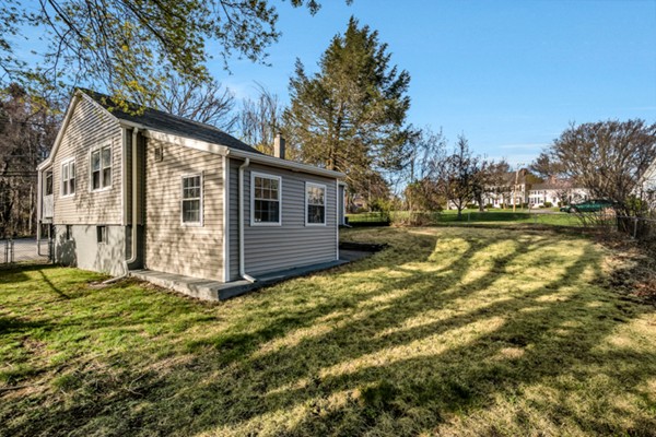 36 Whalom Road Lunenburg, MA 01462 - Photo 26 of 26 a view of a house with backyard and sitting area