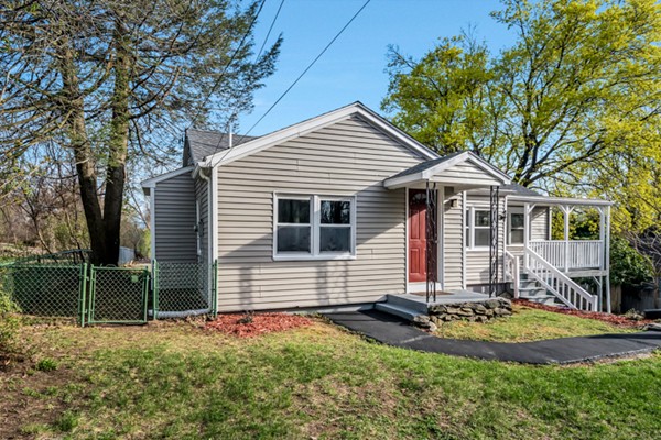 36 Whalom Road Lunenburg, MA 01462 - Photo 3 of 26 a front view of a house with a yard