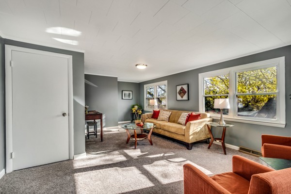 36 Whalom Road Lunenburg, MA 01462 - Photo 7 of 26 a living room with furniture and a large window