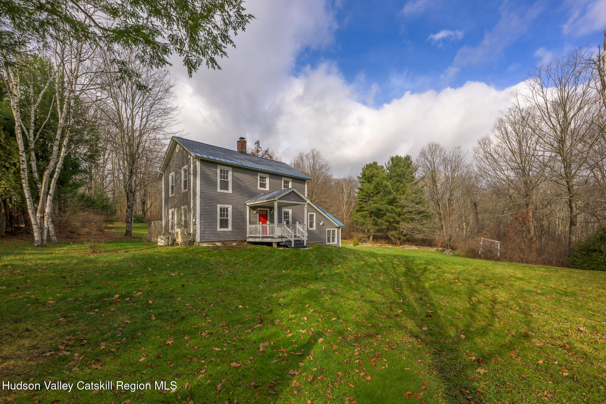 477 Fog Hill Road Austerlitz, NY 12017 - Photo 2 of 33 a front view of a house with yard and green space