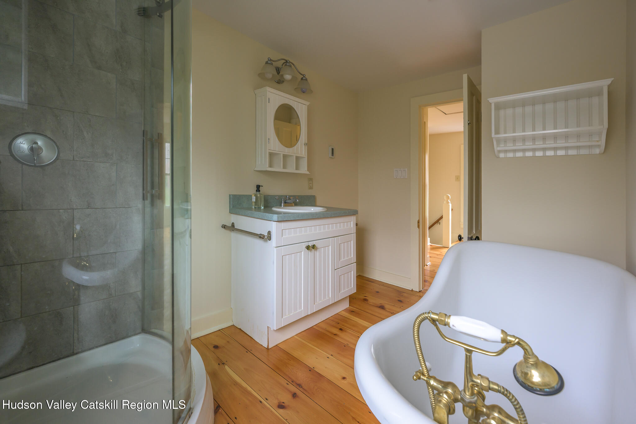 477 Fog Hill Road Austerlitz, NY 12017 - Photo 24 of 33 a bathroom with a sink and mirror