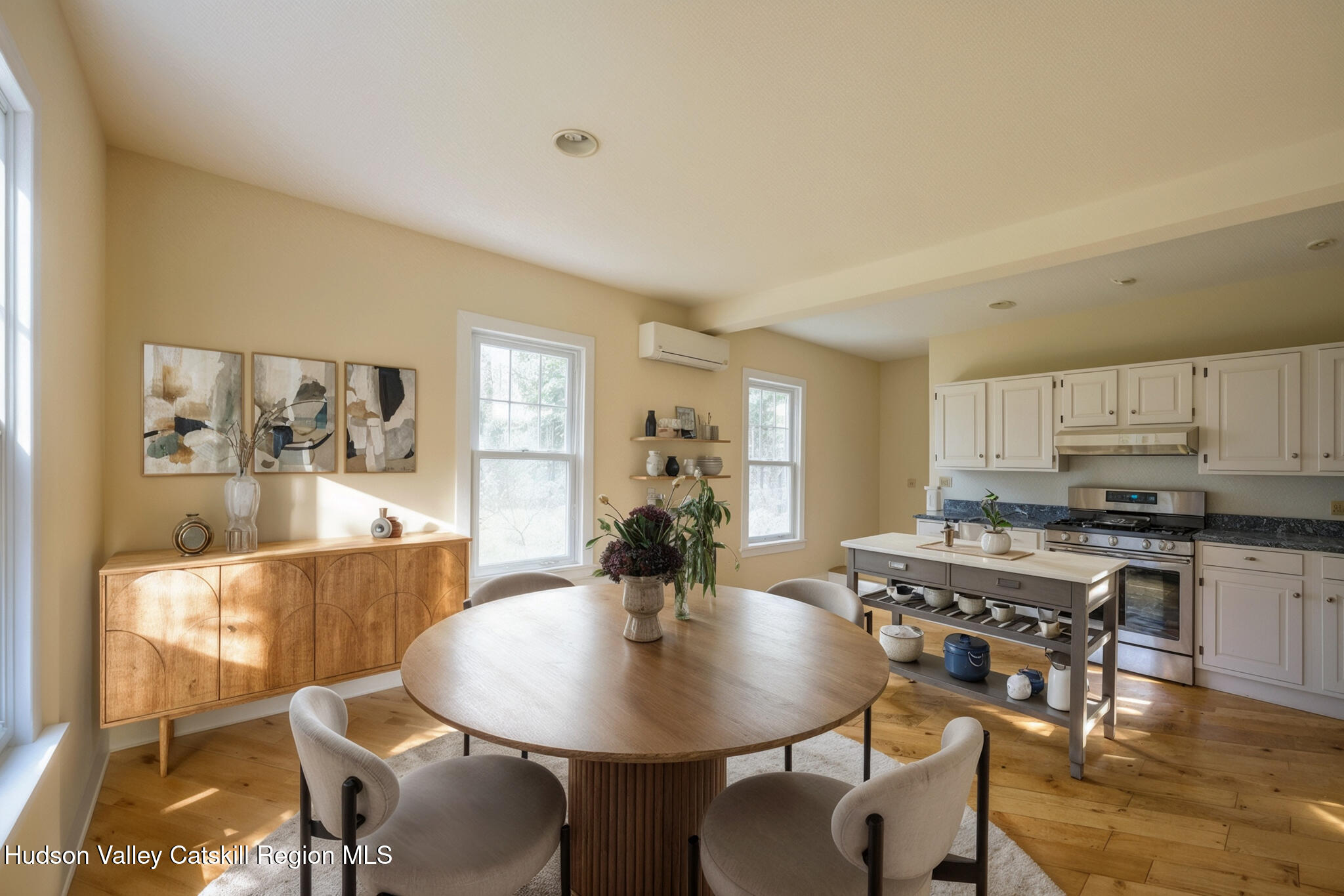 477 Fog Hill Road Austerlitz, NY 12017 - Photo 8 of 33 a view of a dining room with furniture window and wooden floor