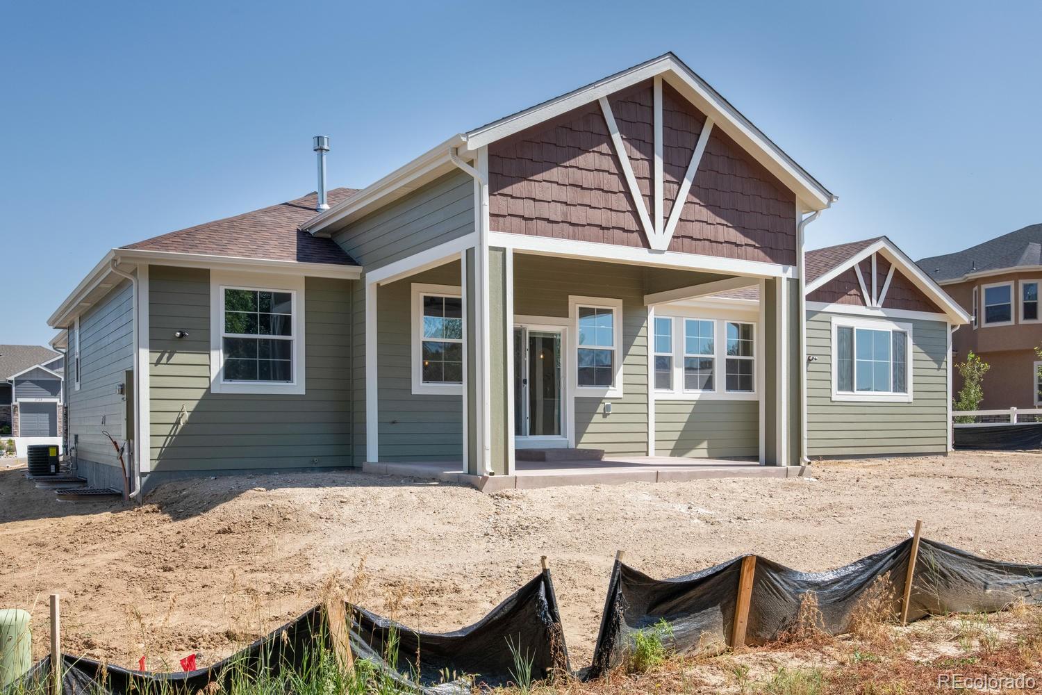 1726 Virginia Drive Fort Lupton, CO 80621 - Photo 35 of 36 a view of house with swimming pool and sitting area