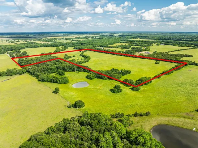 a view of a swimming pool with an ocean view
