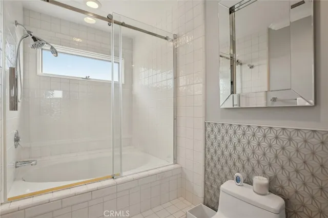 a living room with couch and a window