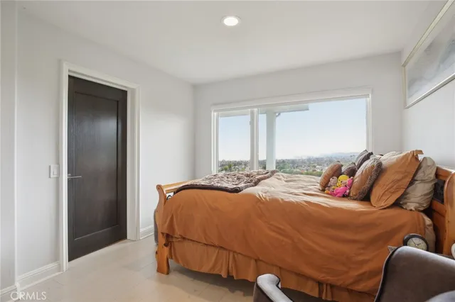 a bathroom with a shower sink and mirror