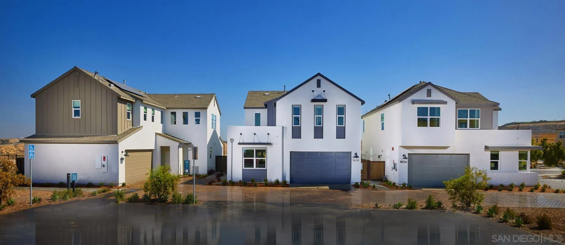 1672 Whitmore Loop, Unit HS PLAN 2 Chula Vista, CA 91913 - Photo 2 of 18 a front view of a house with a yard