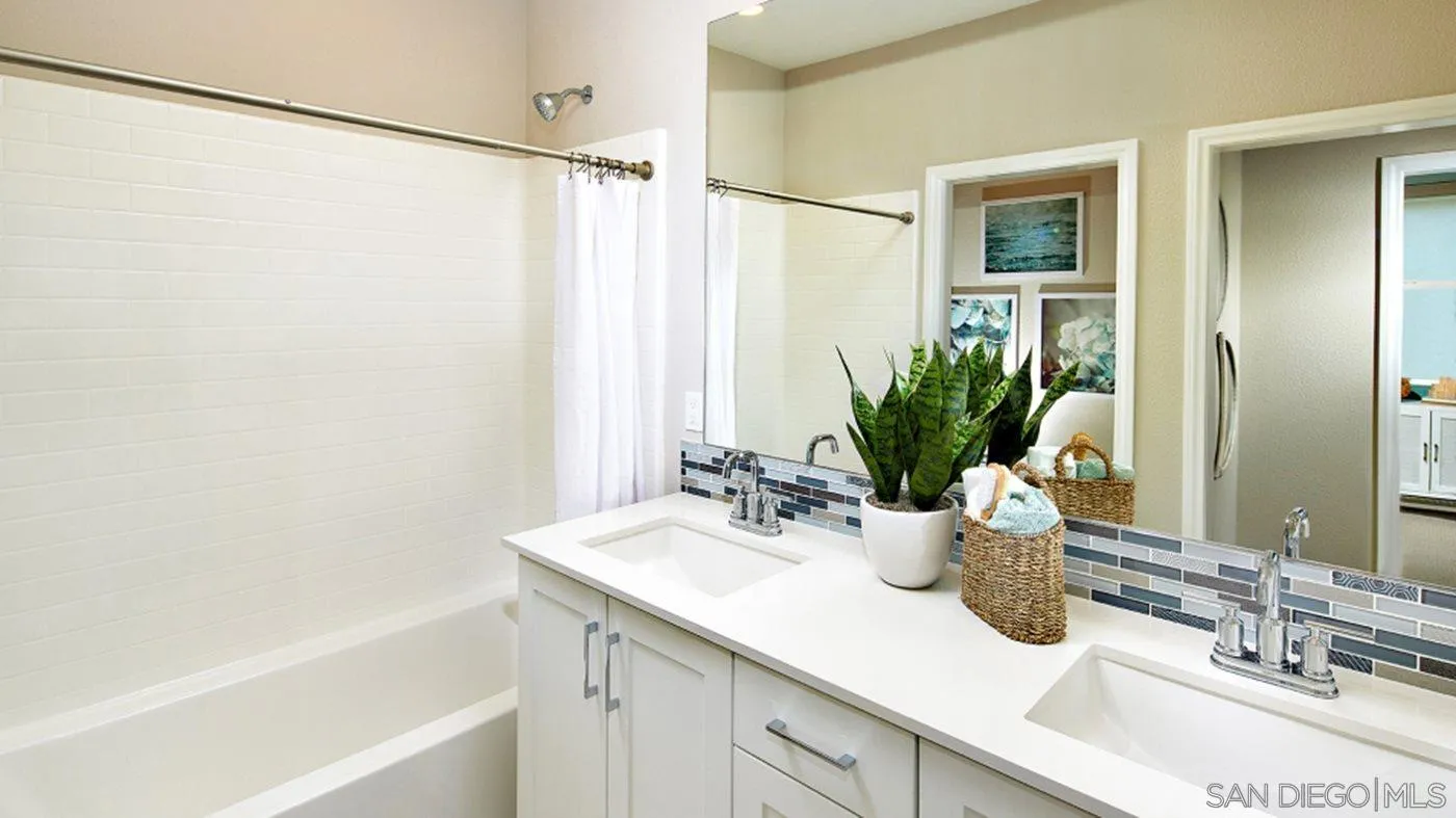 1672 Whitmore Loop, Unit HS PLAN 2 Chula Vista, CA 91913 - Photo 8 of 18 a bathroom with a sink a mirror and a shower