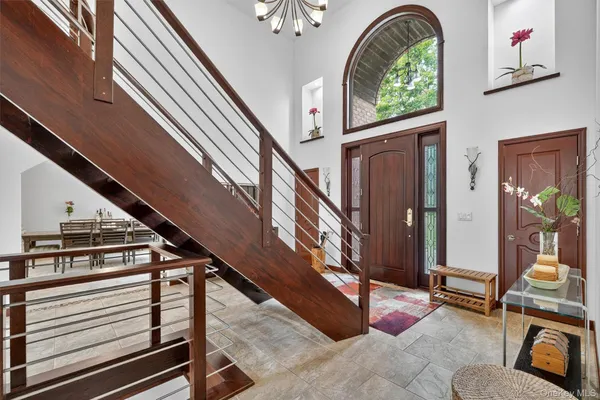 a view of an entryway with staircase