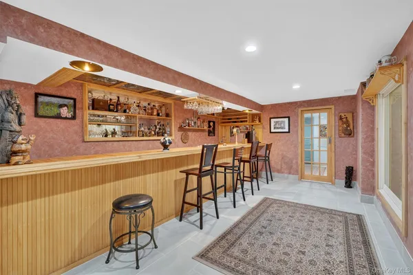 a utility room with sink dryer and washer