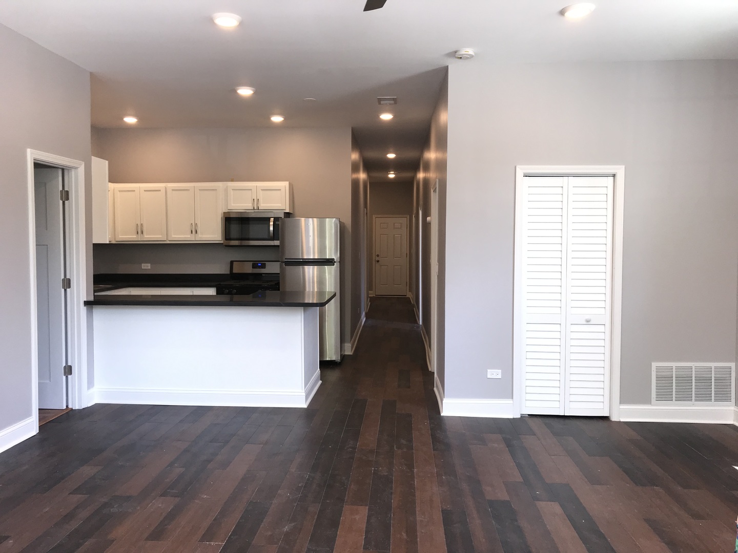 2734 West 18th Street, Unit 1F Chicago, IL 60608 - Photo 2 of 14 a view of kitchen with sink and refrigerator