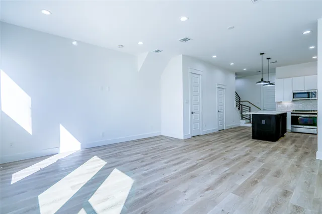 a view of kitchen with wooden floor