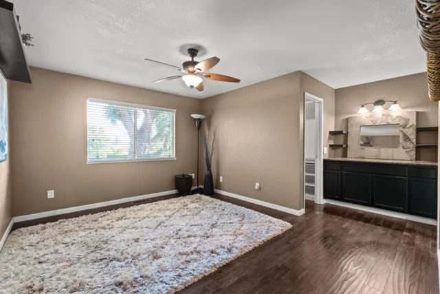 a view of an empty room with a window