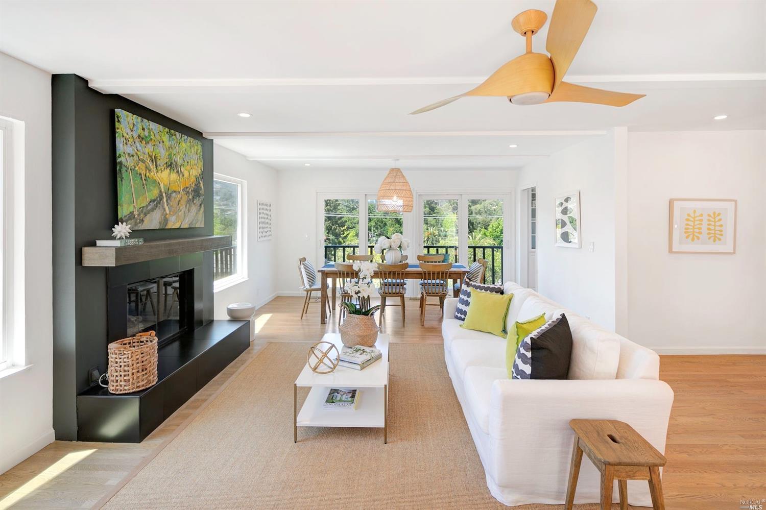 1380 Grand Avenue San Rafael, CA 94901 - Photo 1 of 1 a living room with fireplace furniture and a large window