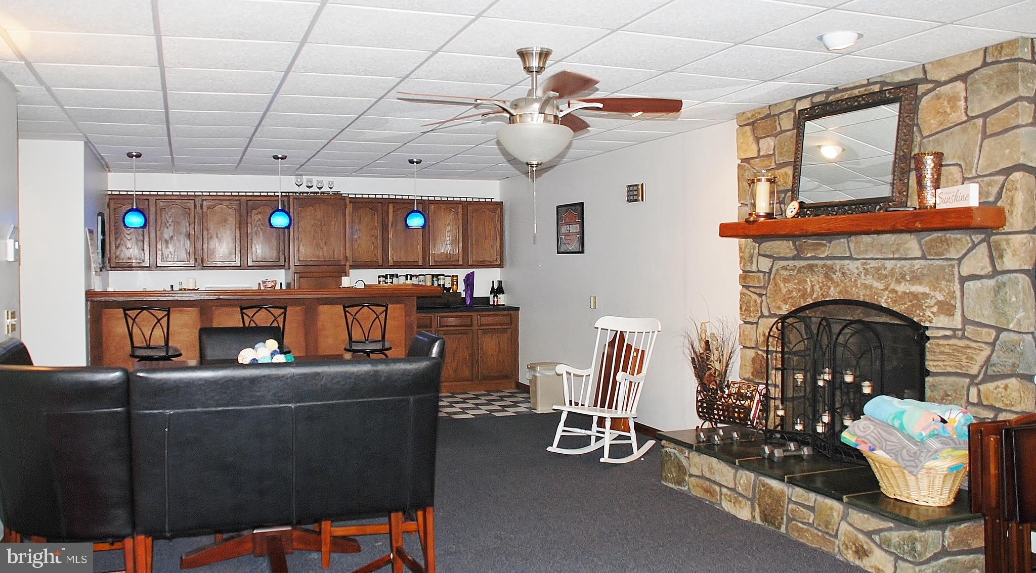 15446 Norman Road Culpeper, VA 22701 - Photo 143 of 146 Stone fireplace in family room on lower level