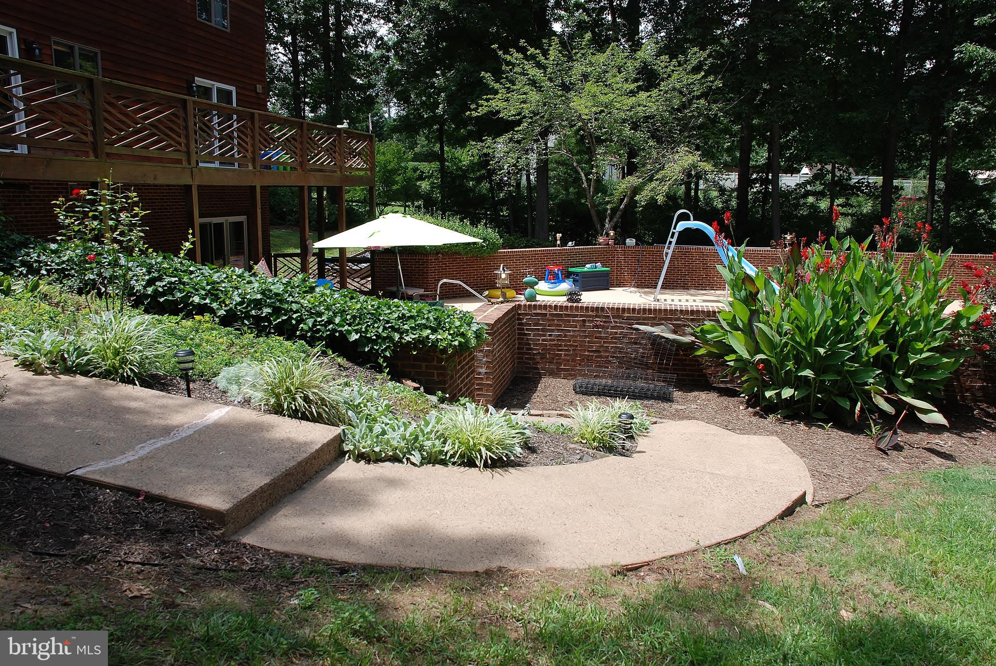 15446 Norman Road Culpeper, VA 22701 - Photo 60 of 146 Sidewalk to in ground pool
