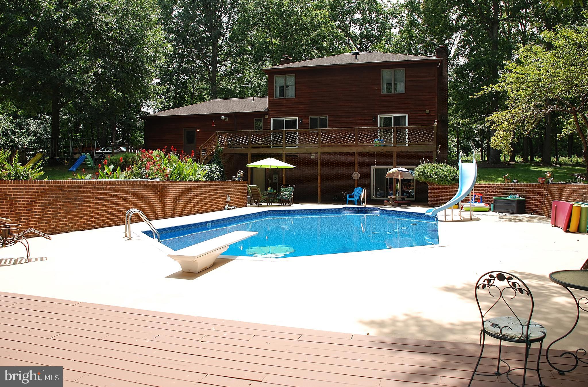 15446 Norman Road Culpeper, VA 22701 - Photo 76 of 146 Pool and rear of house