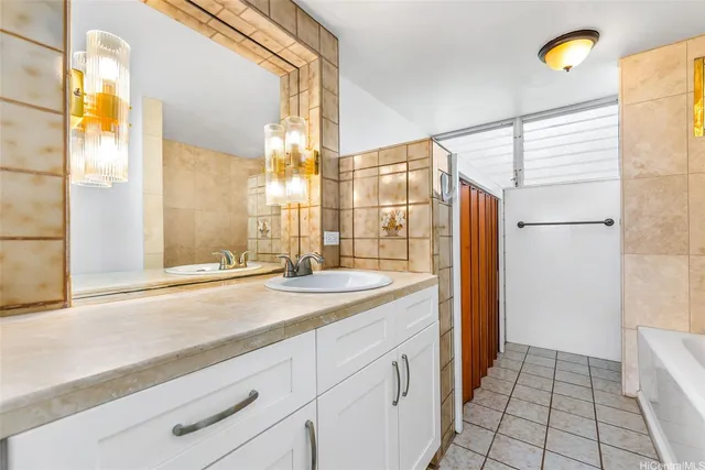 a bathroom with a sink and a shower