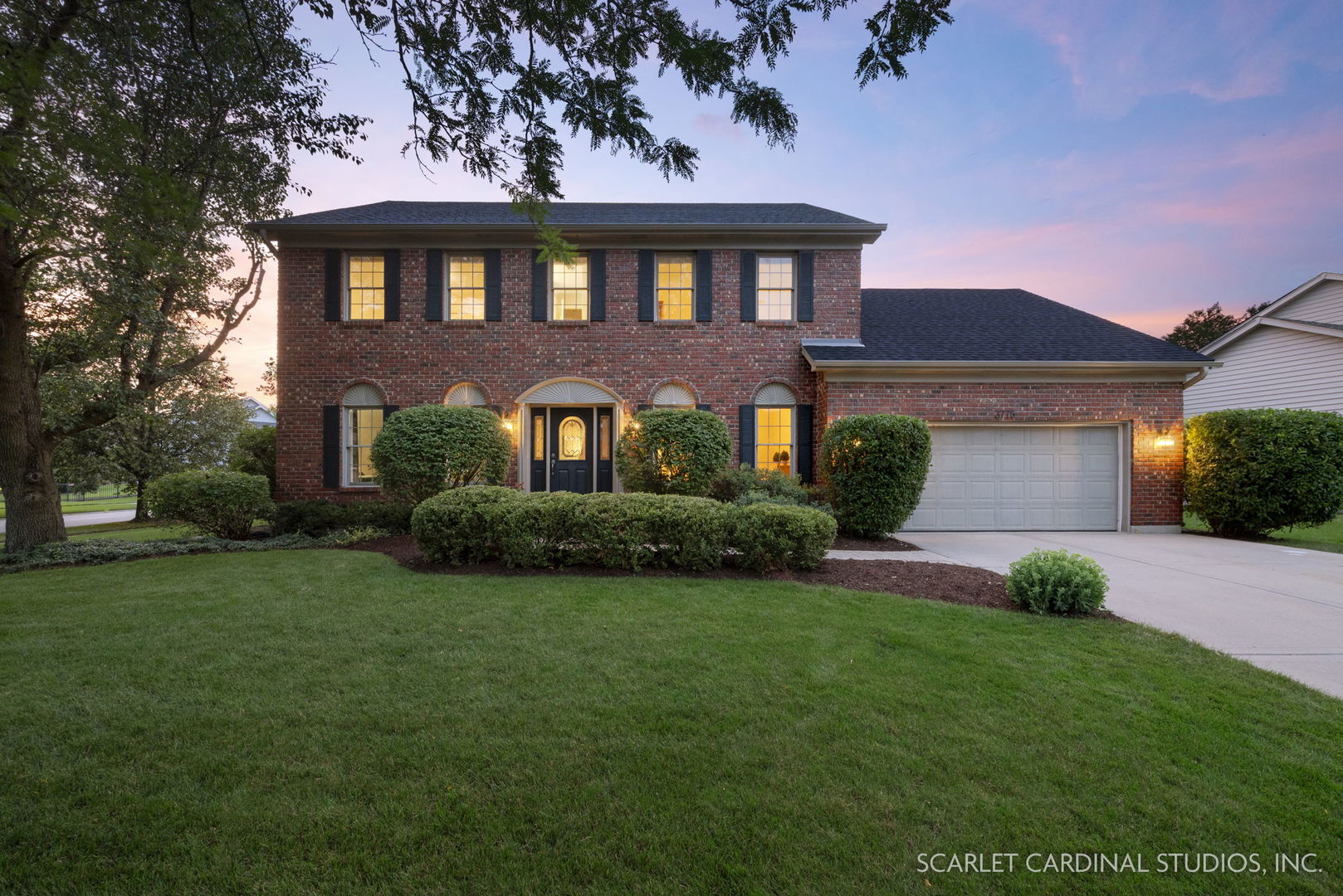 3775 Celeste Lane Naperville, IL 60564 - Photo 1 of 1 a front view of a house with a yard and garage