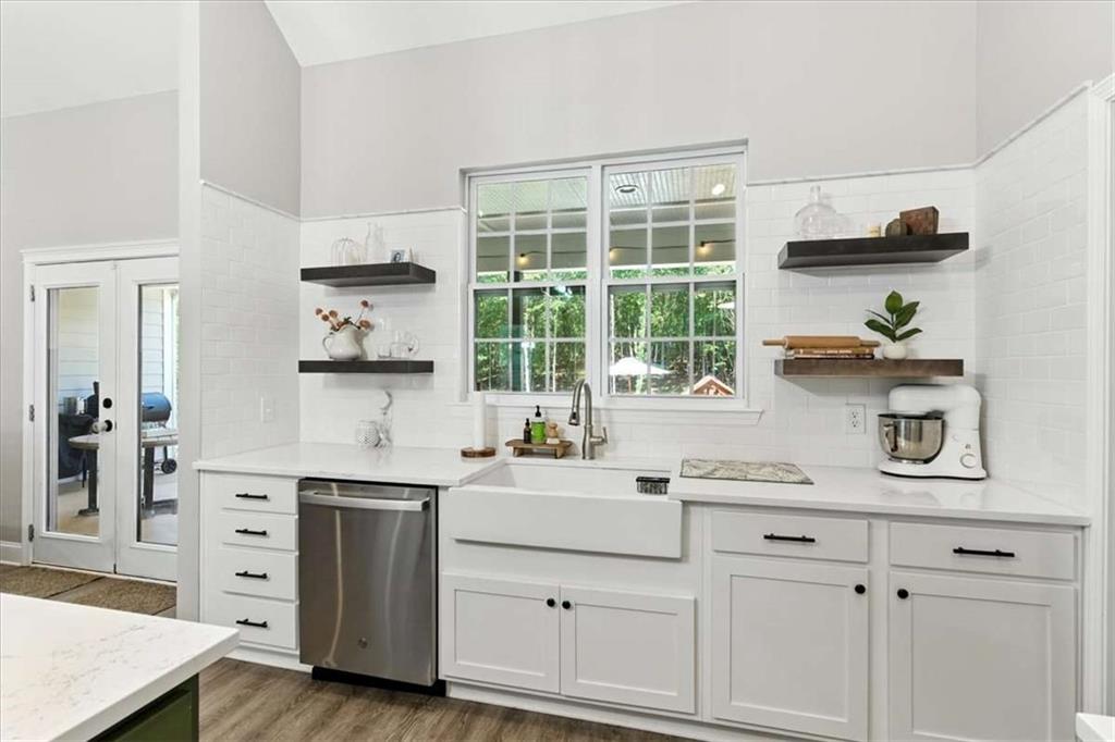 62 Joe Rowell Road Buchanan, GA 30113 - Photo 20 of 63 a kitchen with cabinets and window