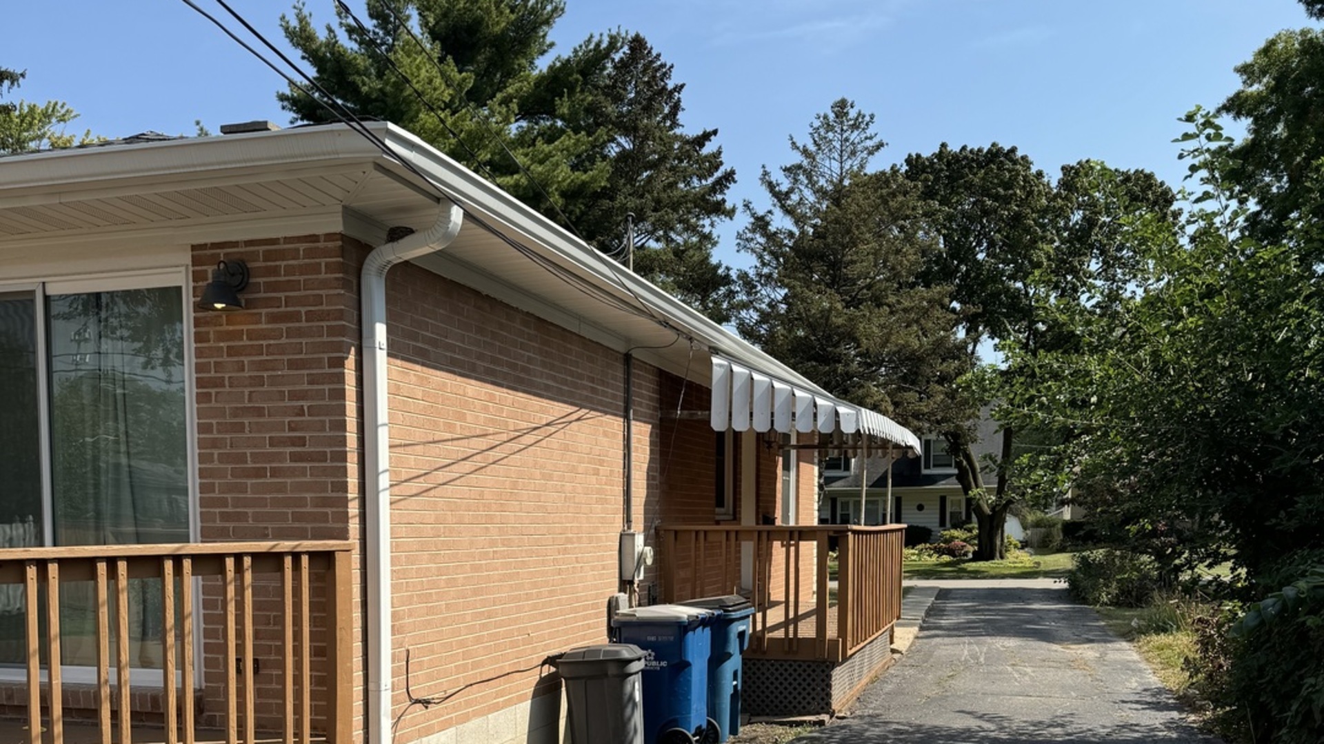 108 South Wisconsin Avenue Addison, IL 60101 - Photo 3 of 27 a backyard of a house with table and chairs