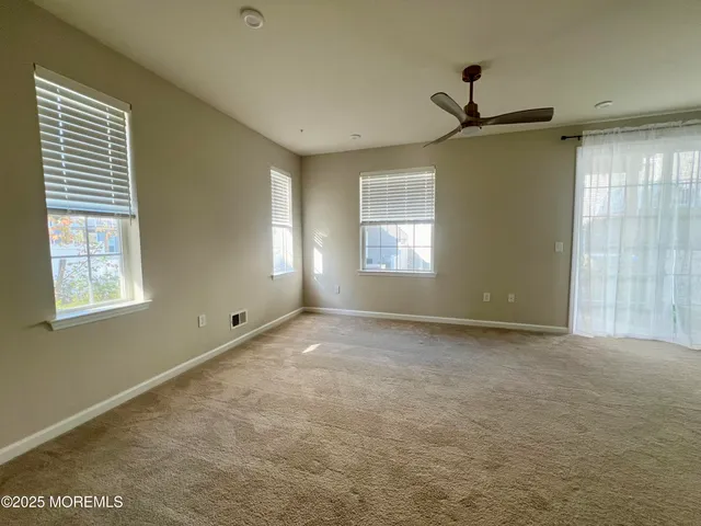 a stove top oven sitting inside of a kitchen