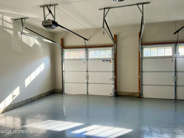 front view of a brick house with a yard