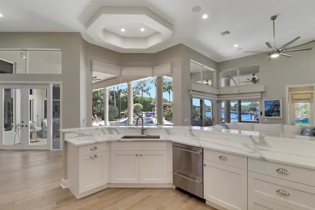 a view of walk in closet with clothes