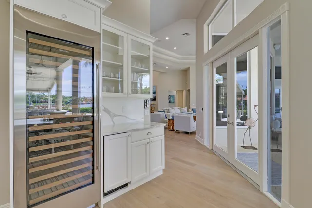 a bathroom with a bathtub sink and mirror