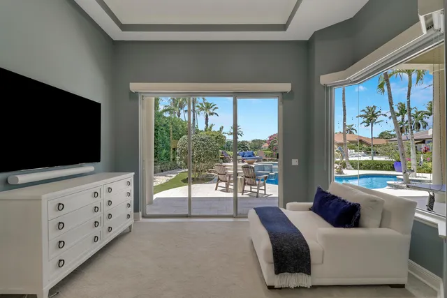 a bathroom with a double vanity sink mirror and shower