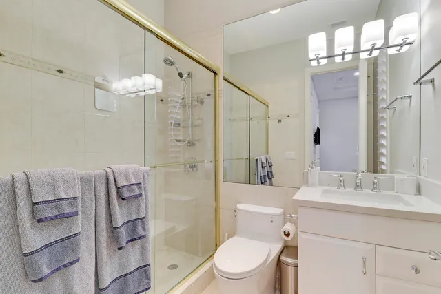 a view of a swimming pool with a patio and a fountain