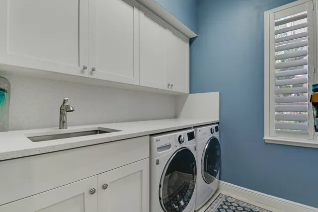 a view of a swimming pool with a yard