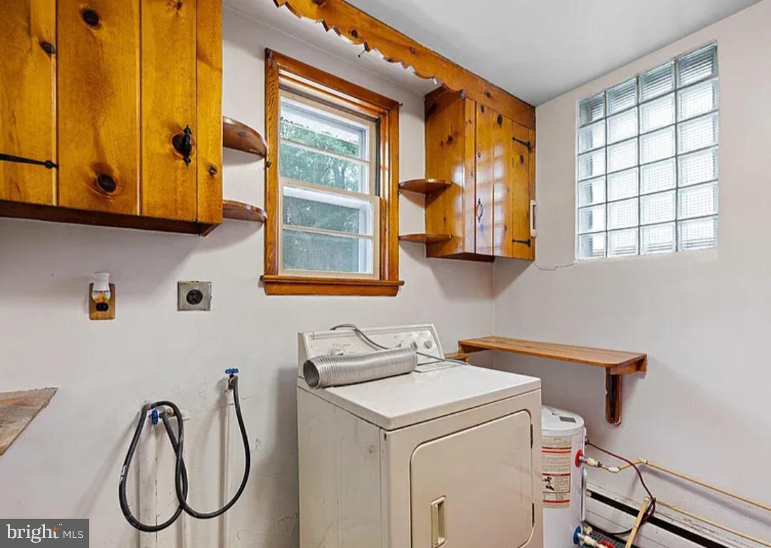 2445 Kenton Road Dover, DE 19904 - Photo 18 of 20 a utility room with dryer and washer