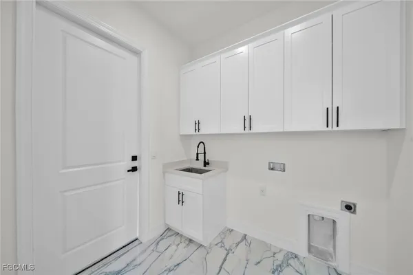 a view of cabinets with wooden floor